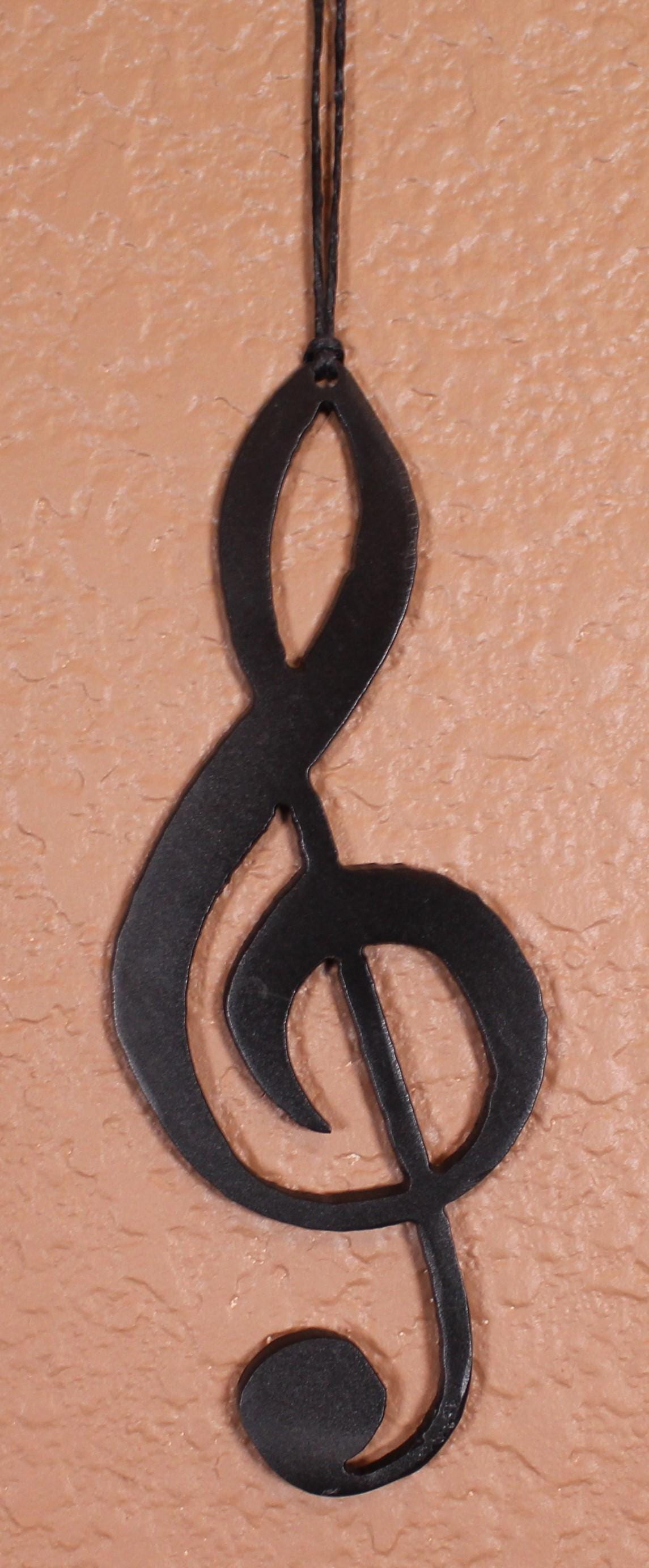 Music Lovers Treble Clef Black or Black and Gold ornament! Great to hang on the wall or on the Christmas Tree. Great for a gift tag.